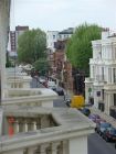 View from balcony up Perham Road towards The Queens Club - tennis